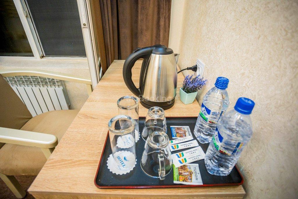 Wantong Hotel Tasjkent Buitenkant foto