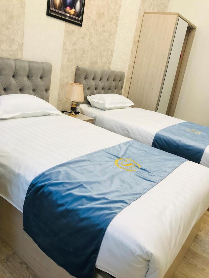 Wantong Hotel Tasjkent Buitenkant foto