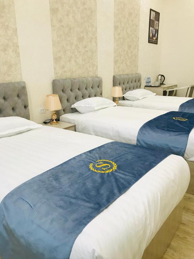 Wantong Hotel Tasjkent Buitenkant foto