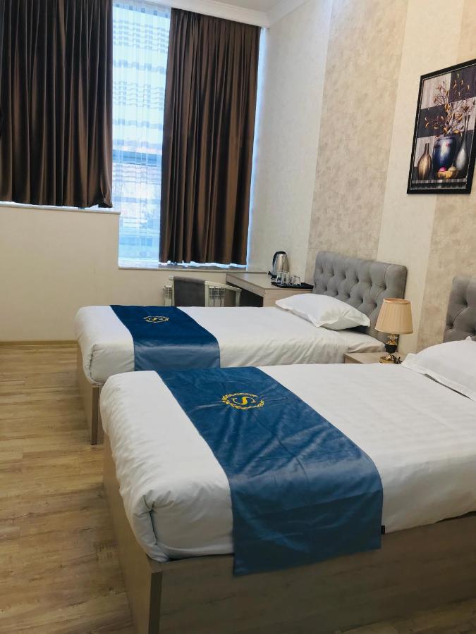 Wantong Hotel Tasjkent Buitenkant foto