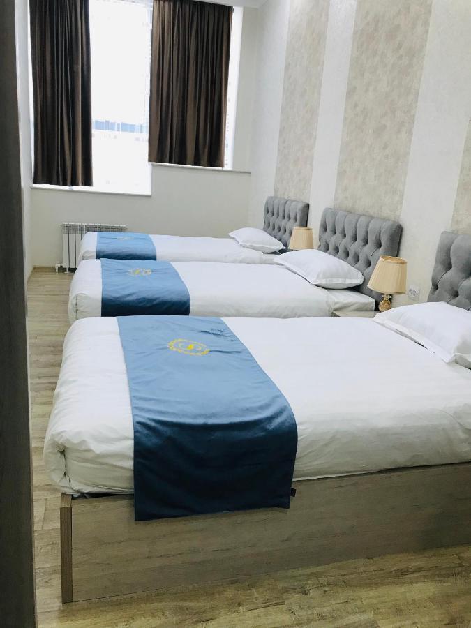 Wantong Hotel Tasjkent Buitenkant foto