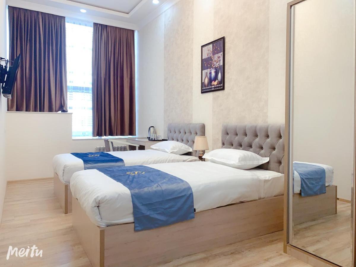 Wantong Hotel Tasjkent Buitenkant foto