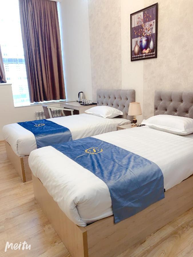 Wantong Hotel Tasjkent Buitenkant foto
